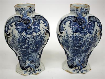 Lot 181 - A PAIR OF LATE 18TH / 19TH CENTURY DUTCH DELFT VASES of moulded inverted baluster form decorated in