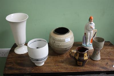 Lot 242A - A BROWN GLAZED STUDIO POTTERY VASE together with a white bisque porcelain Art Pottery vase by Marie