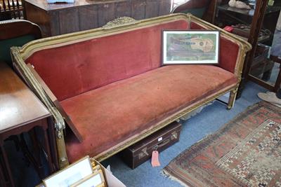 Lot 246 - AN OLD FRENCH CARVED GILTWOOD FRAMED SOFA with floral decoration to the cresting rail
