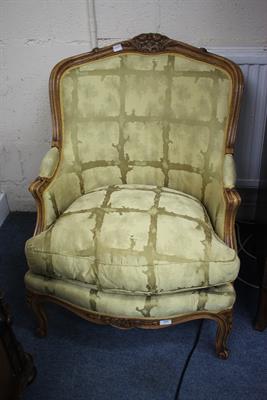 Lot 257 - A PAIR OF LOUIS XV STYLE UPHOLSTERED FAUTEUILS with carved beechwood frames and standing on short