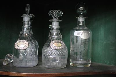 Lot 269 - A COLLECTION OF CUT GLASS DECANTERS