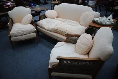 Lot 272 - AN EDWARDIAN SATINWOOD THREE PIECE BERGERE SUITE with overstuffed upholstered backs