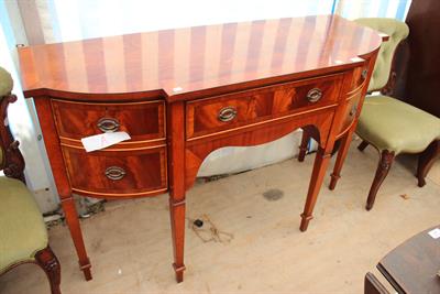 Lot 279 - A GEORGE III STYLE MAHOGANY BOW FRONTED SIDEBOARD the single central drawer flanked by cupboards to