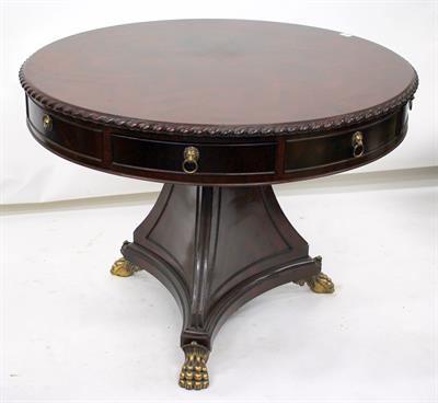 Lot 282 - A REGENCY STYLE CIRCULAR MAHOGANY DRUM TABLE with four drawers standing on a triform base