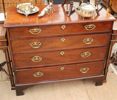 Lot 310 - A GEORGE III MAHOGANY CHEST of four long drawers