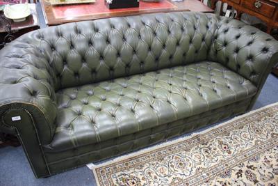 Lot 315 - A GREEN LEATHER BUTTON UPHOLSTERED CHESTERFIELD SOFA approximately 210cm wide