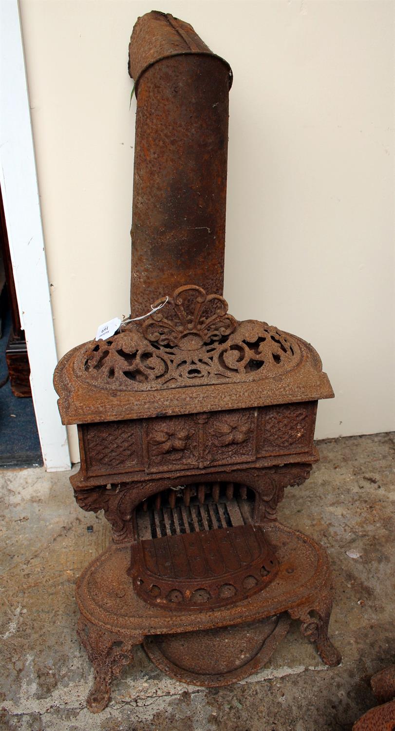Lot 337 - AN OLD CAST IRON SMITH AND WELLSTOOD LIMITED QUEENIE STOVE inscribed The Queen No. 5""