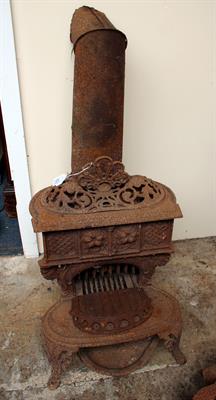Lot 337 - AN OLD CAST IRON SMITH AND WELLSTOOD LIMITED QUEENIE STOVE inscribed The Queen No. 5""