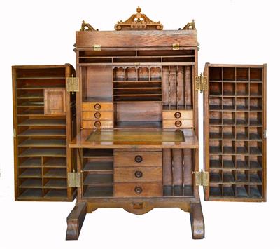 Lot 373 - A LATE 19TH CENTURY AMERICAN OAK WOOTTON TYPE DESK the drawers opening to reveal a writing surface