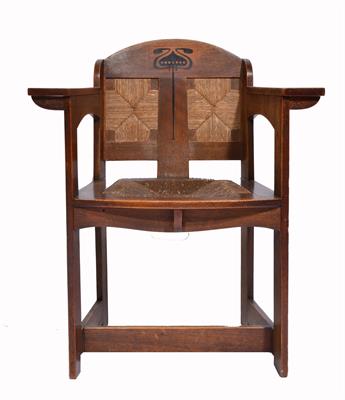 Lot 389 - A LATE VICTORIAN ARTS & CRAFTS OAK WALNUT OPEN ARMCHAIR designed by E.E.G. Punnet with arching back