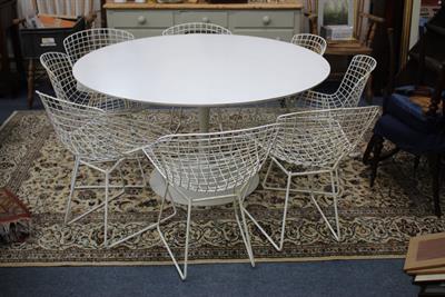 Lot 447 - A MID 20TH CENTURY WHITE ARCARNA CIRCULAR DINING TABLE with central column support and spreading