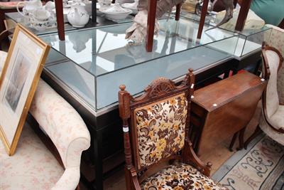 Lot 450 - A GLASS TOPPED BLACK PAINTED TABLE TOP DISPLAY CABINET with iron framed base