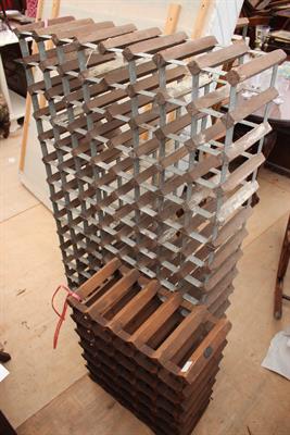 Lot 451 - A HARDWOOD AND GLAVANSED METAL WINE RACK FOR 104 bottles together with a smaller wine rack