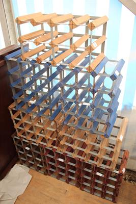 Lot 453 - A GROUP OF SEVEN 12 BOTTLE WINE RACKS together with a further wine rack for 8 bottles (8)
