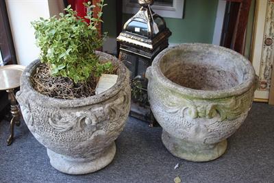 Lot 454 - A PAIR OF OLD CONCRETE URNS with scroll handles