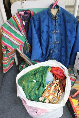 Lot 455 - AN OLD CHINESE BLUE SILK COAT together with a Pulkari coat and various assorted textiles