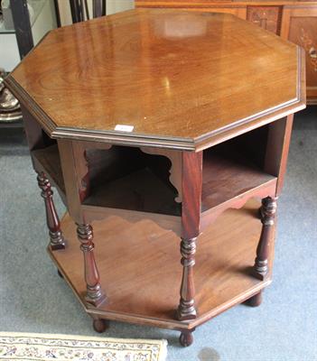 Lot 471 - AN EARLY 20TH CENTURY OCTAGONAL BOOK LIBRARY TABLE with recessed pigeon hole bookshelves on turned