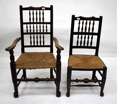 Lot 482 - A SET OF TEN LANCASHIRE ASH SPINDLE BACK DINING CHAIRS with rush seats (two carvers and eight