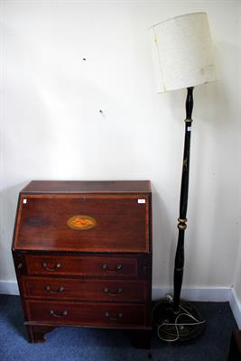 Lot 485 - A CHINOISERIE DECORATED BLACK LACQUERED LAMP STANDARD