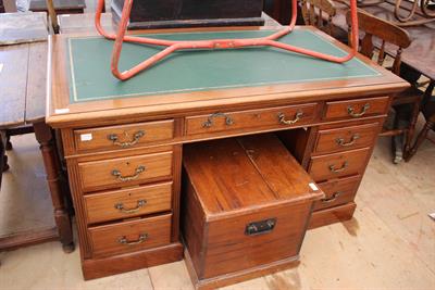 Lot 500 - A MAHOGANY PEDESTAL DESK with green leather inset top 136cm wide