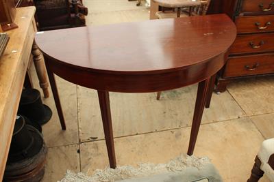 Lot 507 - A LATE 19TH CENTURY MAHOGANY DEMI LUNE TABLE with square tapering legs