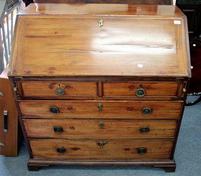 Lot 527 - A GEORGIAN MAHOGANY BUREAU with fall front opening to reveal pigeon holes and drawers above two