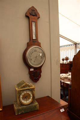 Lot 549 - A GREEN ONYX MANTEL CLOCK