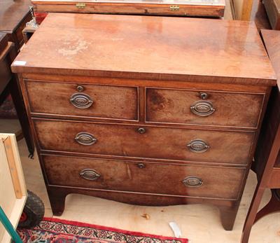 Lot 558 - A VICTORIAN MAHOGANY CHEST of two short and two long drawers standing on bracket feet