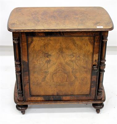 Lot 563 - A SMALL VICTORIAN WALNUT CUPBOARD with panelled door