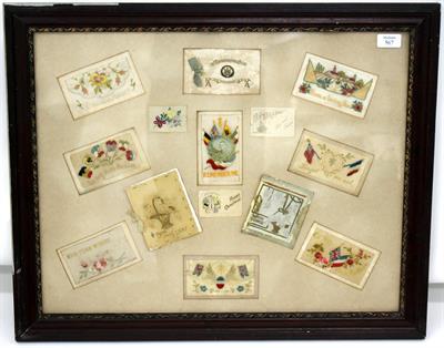Lot 567 - A GROUP OF FOURTEEN VARIOUS WORLD WAR I CHRISTMAS CARDS and other related ephemera mounted in a