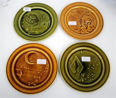 Lot 571 - A SET OF FOUR FRENCH POTTERY PLATES impressed