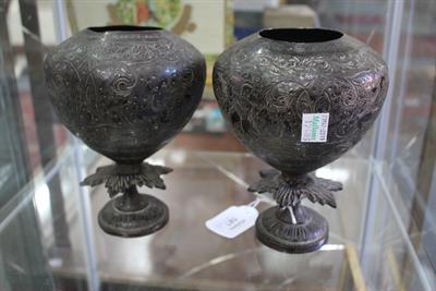 Lot 587 - A PAIR OF 19TH CENTURY EASTERN BRONZE URNS each decorated with figures and geometric floral patterns