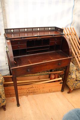 Lot 633 - A 19TH CENTURY ROSEWOOD ROLL TOP DESK with galleried top and single drawer on square tapering legs