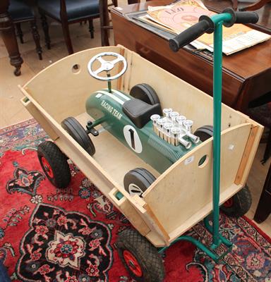 Lot 645 - A CHILD'S PULL ALONG HAND CART with pneumatic tyres