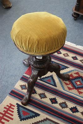 Lot 663 - A VICTORIAN MAHOGANY FRAMED PIANO STOOL with overstuffed upholstered seat