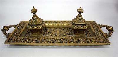 Lot 667 - AN ANTIQUE CONTINENTAL CAST BRASS DESK STAND with pierced renaissance revival style decoration and