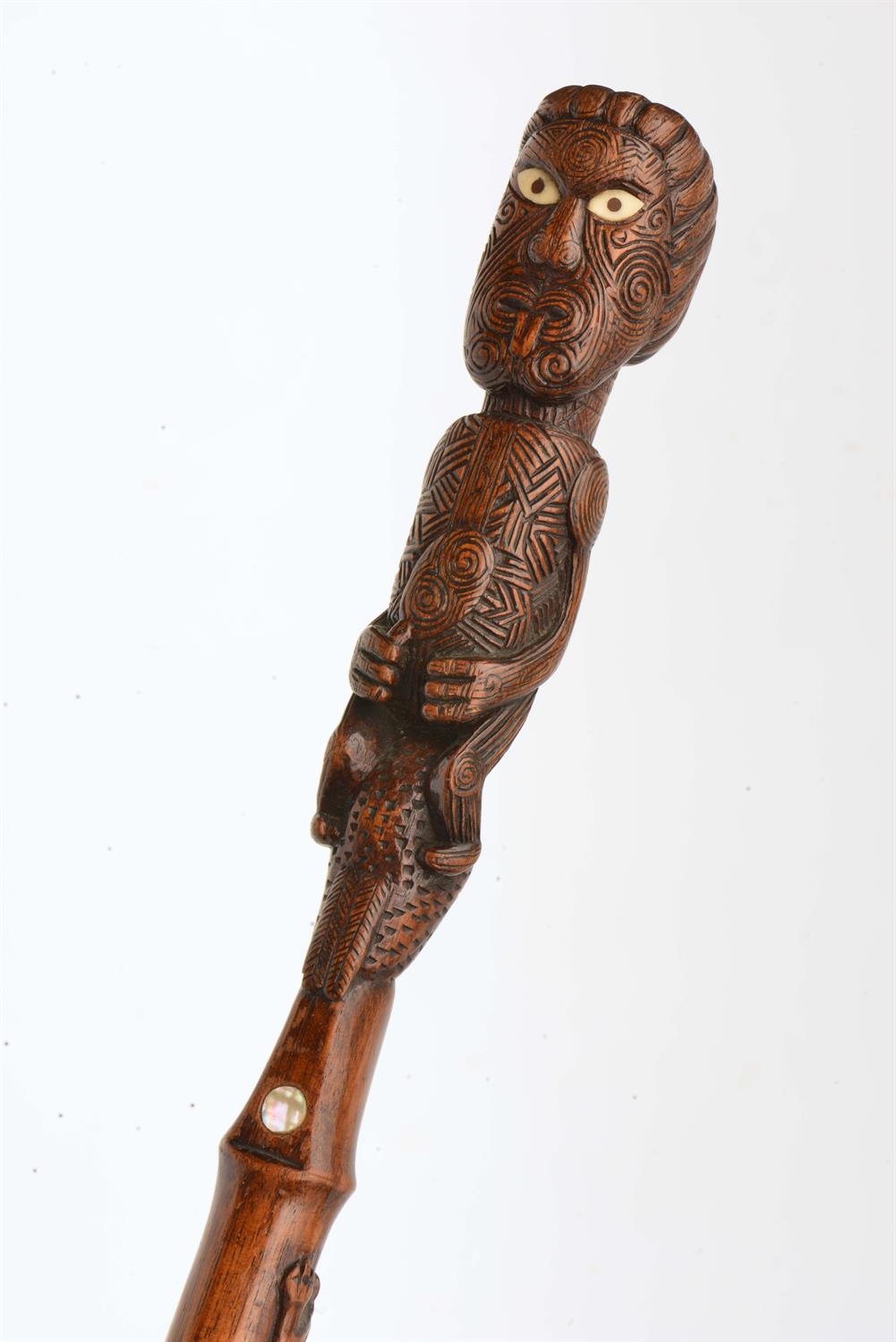 Maouri Lot 252 - A 20TH CENTURY CARVED WOODEN MAOURI WALKING