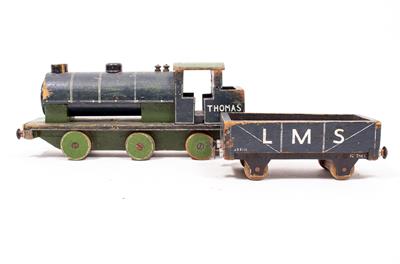 Lot 73 - A PAINTED WOODEN TOY TRAIN AND TENDER