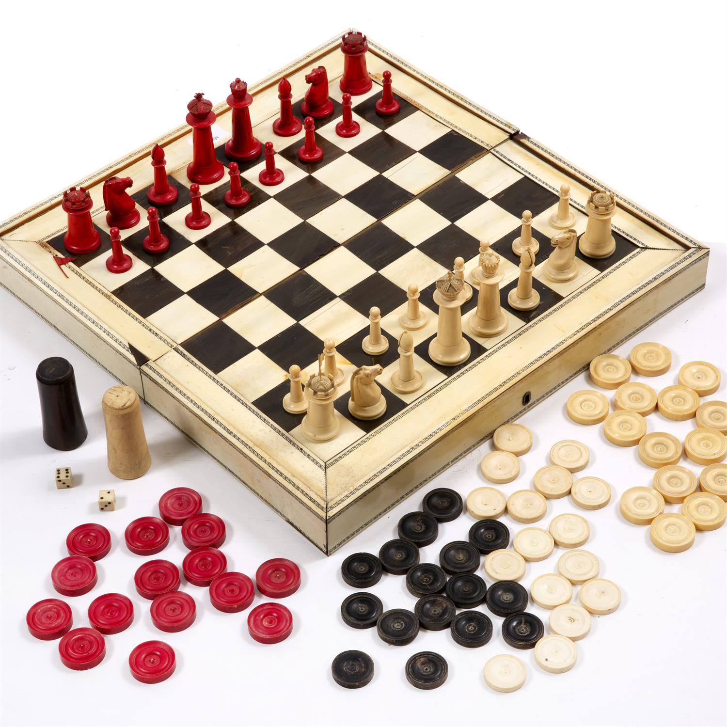 96 - A 19TH CENTURY VIZAGAPATAM ANGLO INDIAN IVORY AND EBONY CHESS