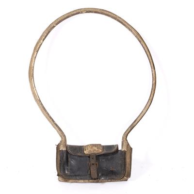 Lot 219 - A LEATHER AND IRON RAILWAY TOKEN HOLDER