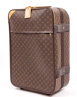 Lot 243 - A LOUIS VUITTON MONOGRAMMED TRAVELLING SUITCASE