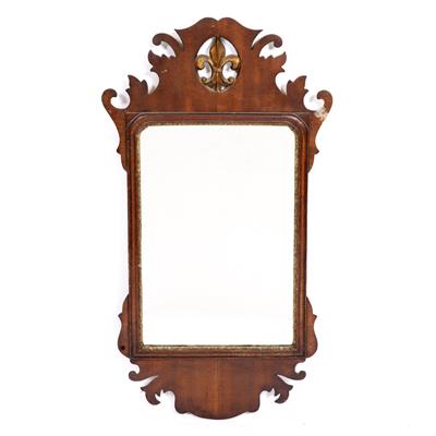 Lot 478 - A FRET FRAMED WALL MIRROR