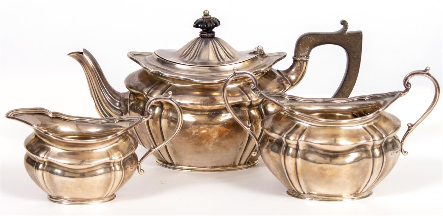 Lot 513 - A THREE PIECE SILVER TEA SET