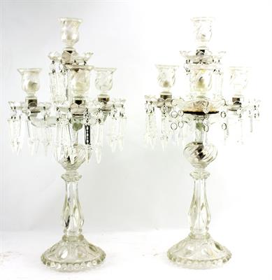 Lot 574 - A PAIR OF PRESSED GLASS FOUR LIGHT CANDELABRA