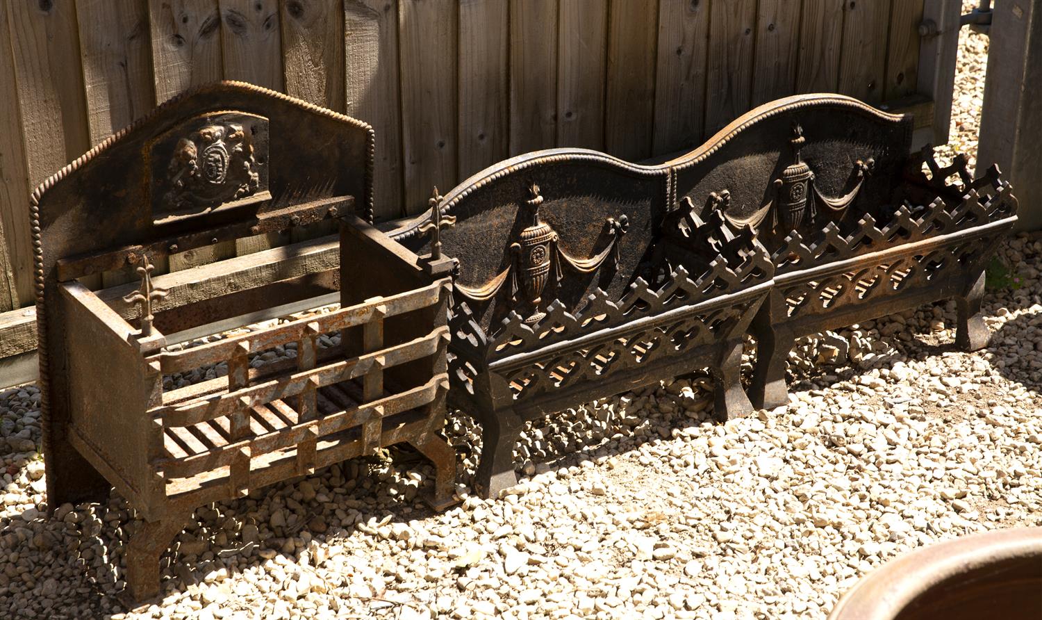 Lot 639 - A PAIR OF CAST IRON FIRE GRATES