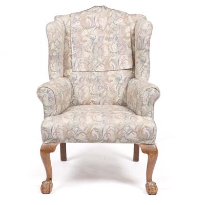 Lot 658 - A GEORGIAN STYLE UPHOLSTERED WING BACK ARMCHAIR