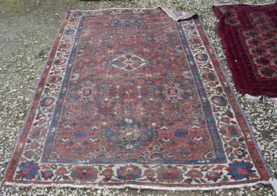 Lot 669 - AN EARLY 20TH CENTURY TEKKE TURKOMAN RED GROUND RUG