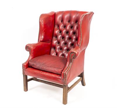 Lot 772 - A RED BUTTON UPHOLSTERED GEORGIAN STYLE WING BACK ARMCHAIR