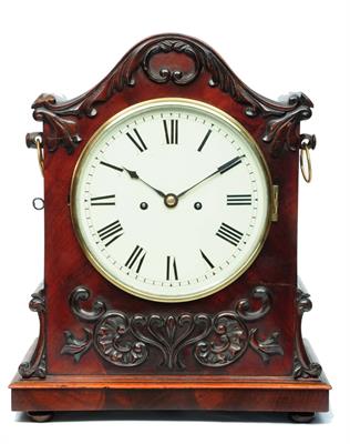 Lot 9 - A VICTORIAN MAHOGANY BRACKET CLOCK the circular Roman dial with cast brass bezel