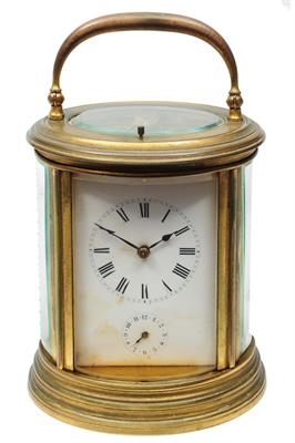 Lot 10 - A LATE 19TH CENTURY FRENCH OVAL GRANDE SONNERIE CARRIAGE CLOCK the white enamel Roman dial with